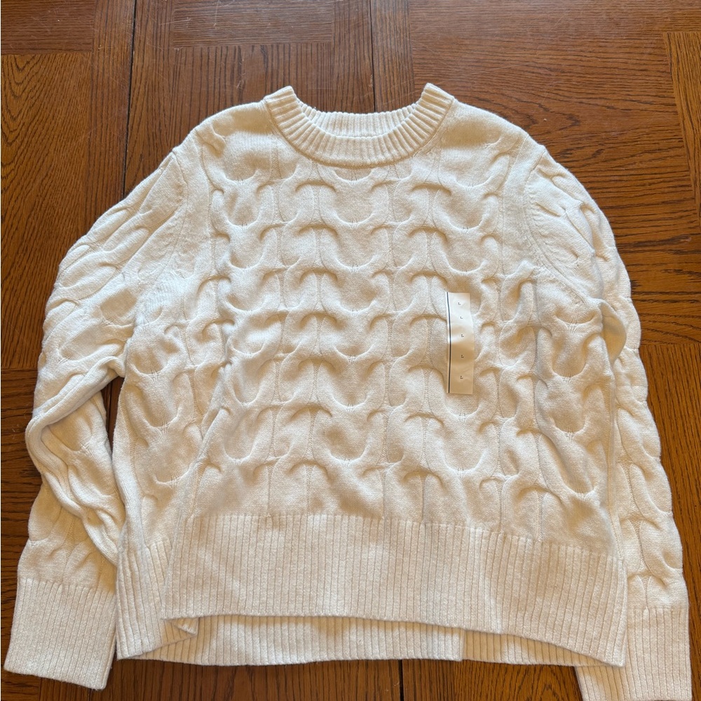 A new day cream sweater